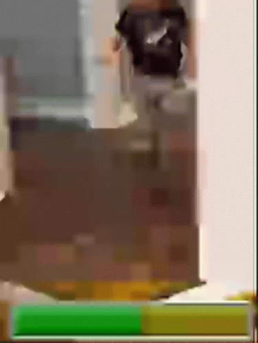 A Person Is Standing In Front Of A Dresser In A Room With A Green Screen . GIF