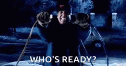 A Person Is Standing In Front Of A Fire With The Words `` Who 'S Ready ? '' . GIF