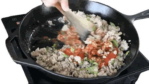 A Person Is Stirring A Skillet With Meat And Tomato Sauce Sticker