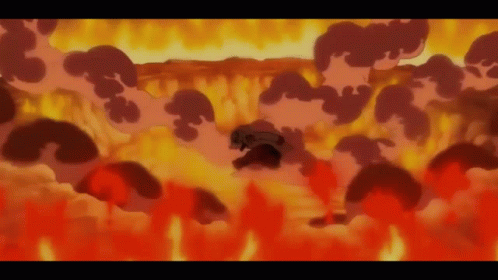 A Person Is Surrounded By Flames And Smoke GIF