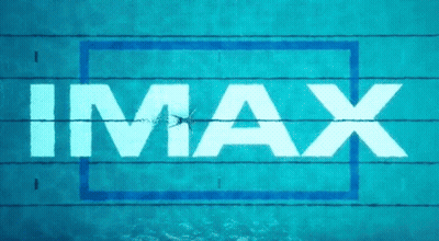 A Person Is Swimming In A Pool With The Word Imax Above Them GIF