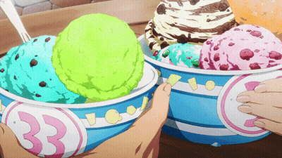 A Person Is Taking A Scoop Of Ice Cream From A Bowl With The Number 33 On It GIF