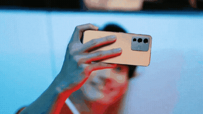 A Person Is Taking A Selfie With A Phone That Has A Camera On It GIF