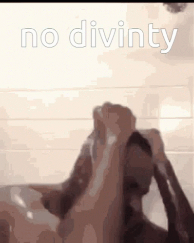 A Person Is Taking A Shower With The Words No Divinity Written On The Bottom GIF