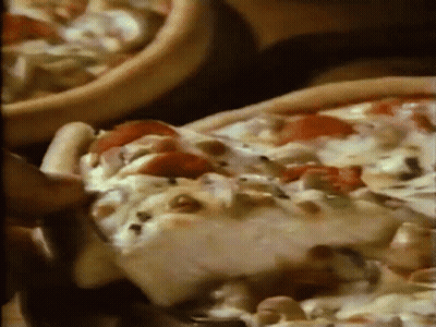 A Person Is Taking A Slice Of Pizza From A Pizza GIF