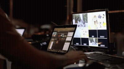 A Person Is Using A Dell Computer And A Dell Tablet GIF
