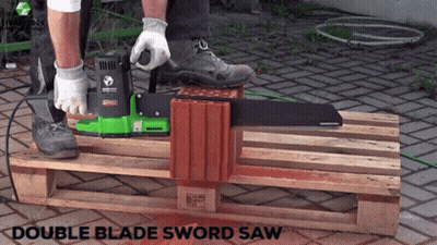 A Person Is Using A Double Blade Sword Saw To Cut A Piece Of Wood GIF