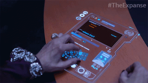 A Person Is Using A Futuristic Device That Says Where They On It GIF