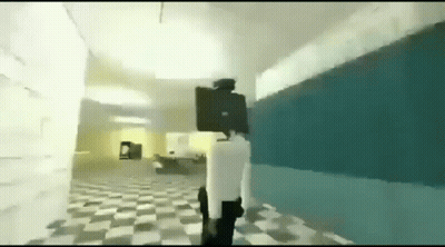 A Person Is Walking Down A Hallway In A Video Game With A Gun In Their Hand . GIF