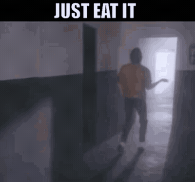 A Person Is Walking Down A Hallway With The Words `` Just Eat It '' Written On The Bottom . GIF