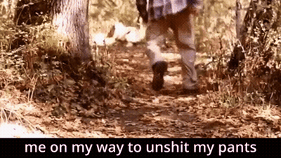 A Person Is Walking Down A Path With The Words Me On My Way To Unshit My Pants Below Them GIF