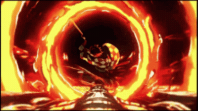 A Person Is Walking Through A Fire Tunnel GIF