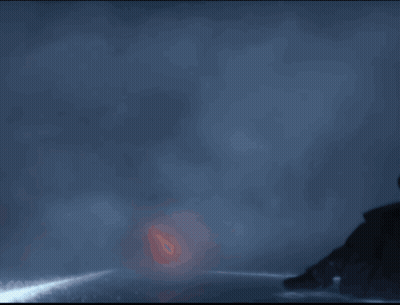 A Person Is Walking Through A Tunnel Of Fire GIF