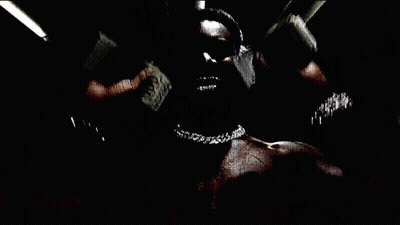 A Person Is Wearing A Bracelet On Their Wrist In A Dark Room GIF