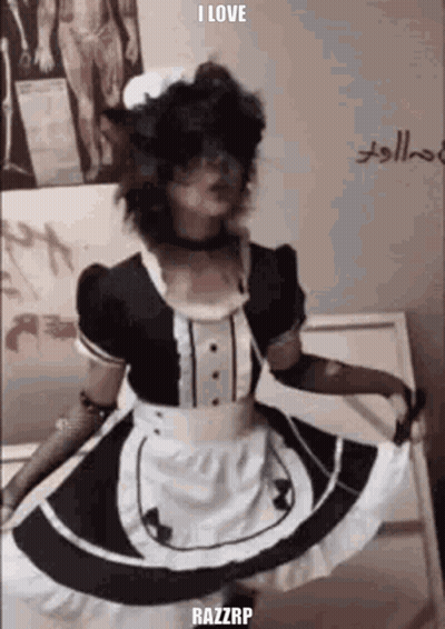 A Person Is Wearing A Maid Costume And Dancing . GIF