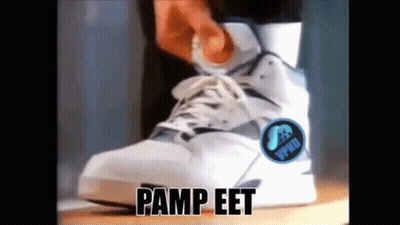 A Person Is Wearing A Pair Of Pump Eet Sneakers GIF