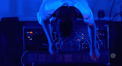 A Person Is Working On A Device That Has The Word Modular On The Front GIF