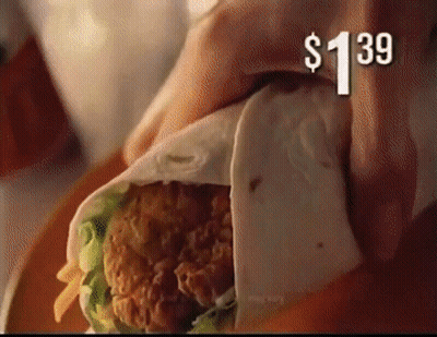 A Person Is Wrapping A Chicken Sandwich In A Tortilla With A Price Tag Of $ 1.39 GIF