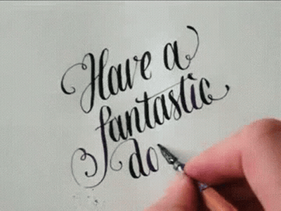 A Person Is Writing The Words `` Have A Fantastic Day '' In Calligraphy On A Piece Of Paper . GIF