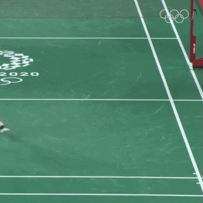 A Person Kneeling On A Tennis Court With The Year 2020 GIF