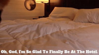 A Person Laying On A Bed With The Words Oh God I 'M So Glad To Finally Be At The Hotel Below Them GIF