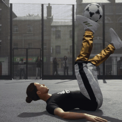 A Person Laying On The Ground With A Soccer Ball On Their Foot GIF