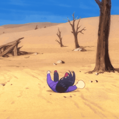 A Person Laying On Their Back In The Desert GIF