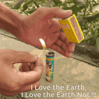 a person lighting a match with the words " i love the earth i love the earth not " below them