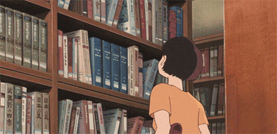 A Person Looking At Books On A Shelf With One That Says ' Chinese ' On The Front GIF