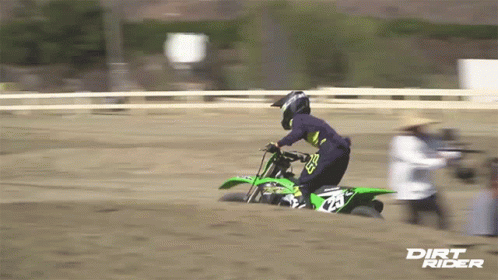 A Person On A Dirt Bike With Dirt Rider On The Bottom GIF