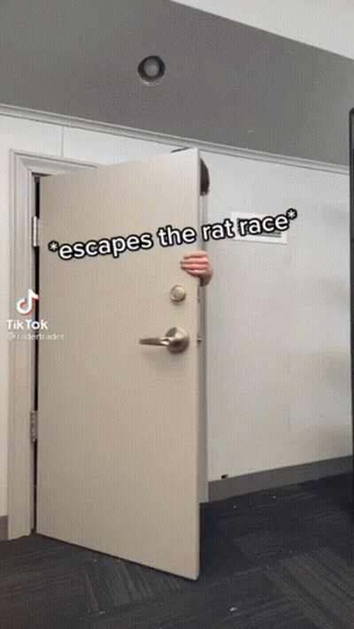 A Person Peeking Out From Behind A Door That Says " Escapes The Rat Race " On It GIF