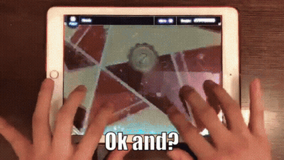 A Person Playing A Game On A Tablet With The Words Ok And Written On The Screen GIF