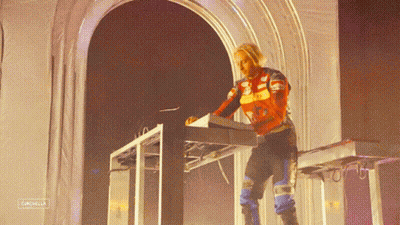 A Person Playing A Keyboard With The Word Catchella On The Bottom Right GIF