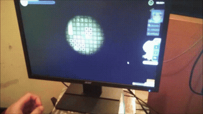 A Person Playing A Video Game On An Acer Computer Monitor GIF