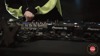 A Person Playing Music On A Pioneer Dj Turntable GIF