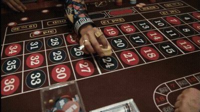 A Person Playing Roulette With The Words " I 'Ll Take That Bet " Below GIF