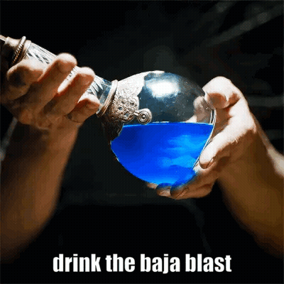 A Person Pouring Blue Liquid Into A Glass With The Words Drink The Baja Blast GIF