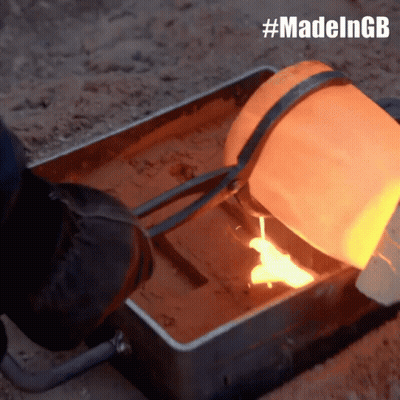 A Person Pouring Molten Metal Into A Metal Container With The Hashtag #Madelngb On The Bottom GIF