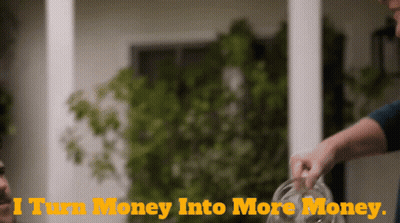 A Person Pouring Money Into A Glass With The Words I Turn Money Into More Money Below Them GIF