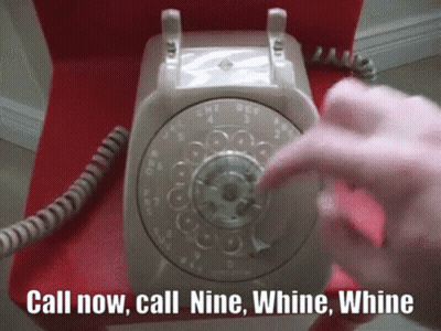 A Person Pressing A Button On A Telephone That Says Call Now GIF