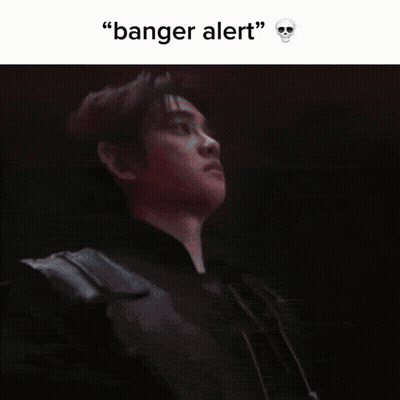 A Person Pressing A Button With The Words " Banger Alert " Above Them GIF