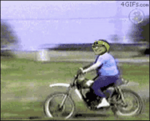A Person Riding A Dirt Bike With A 4Gifs.com Logo On The Bottom Right GIF