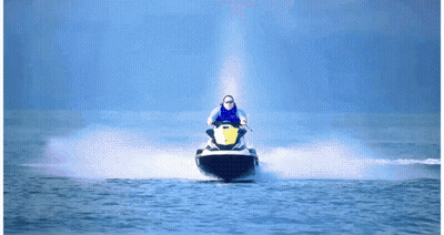 A Person Riding A Jet Ski With A Yellow Sticker On The Front GIF