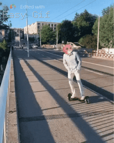 A Person Riding A Skateboard On A Bridge With The Words Edited With Easy Gif At The Bottom GIF