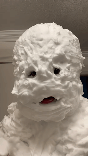 A Person 'S Face Is Covered In Shaving Cream With A Red Lip GIF