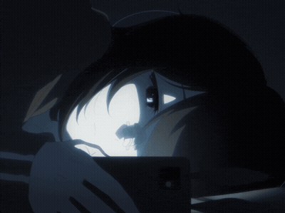 A Person 'S Face Is Shown In The Dark With A Light Coming Out Of It GIF
