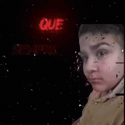A Person 'S Face Is Visible In Front Of A Neon Sign That Says Nanda Audio . GIF