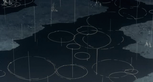 A Person 'S Foot Is Splashing In A Puddle Of Water With A Drawing Of A Heart On The Ground GIF