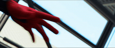 A Person 'S Hand In A Red Glove Reaches Out Towards A Window GIF