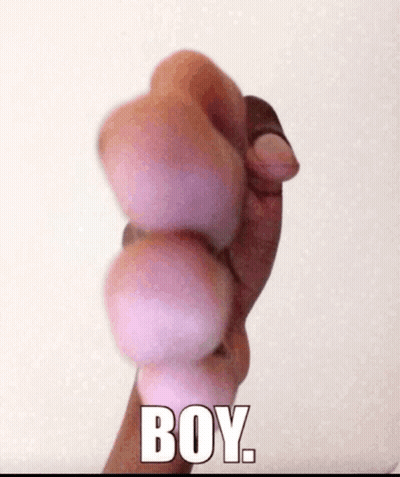 A Person 'S Hand Is Holding A Ball And The Word Boy Is On The Bottom GIF